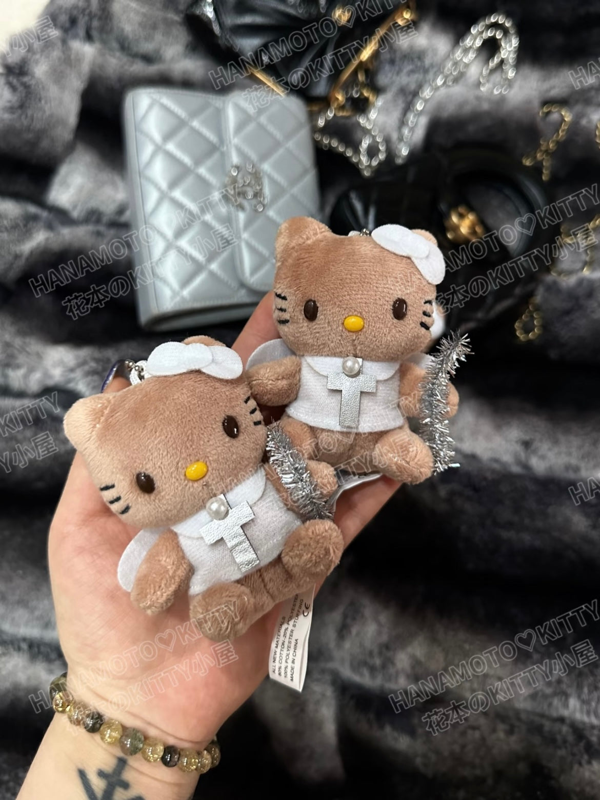 Angel tanned hello kitty pendant