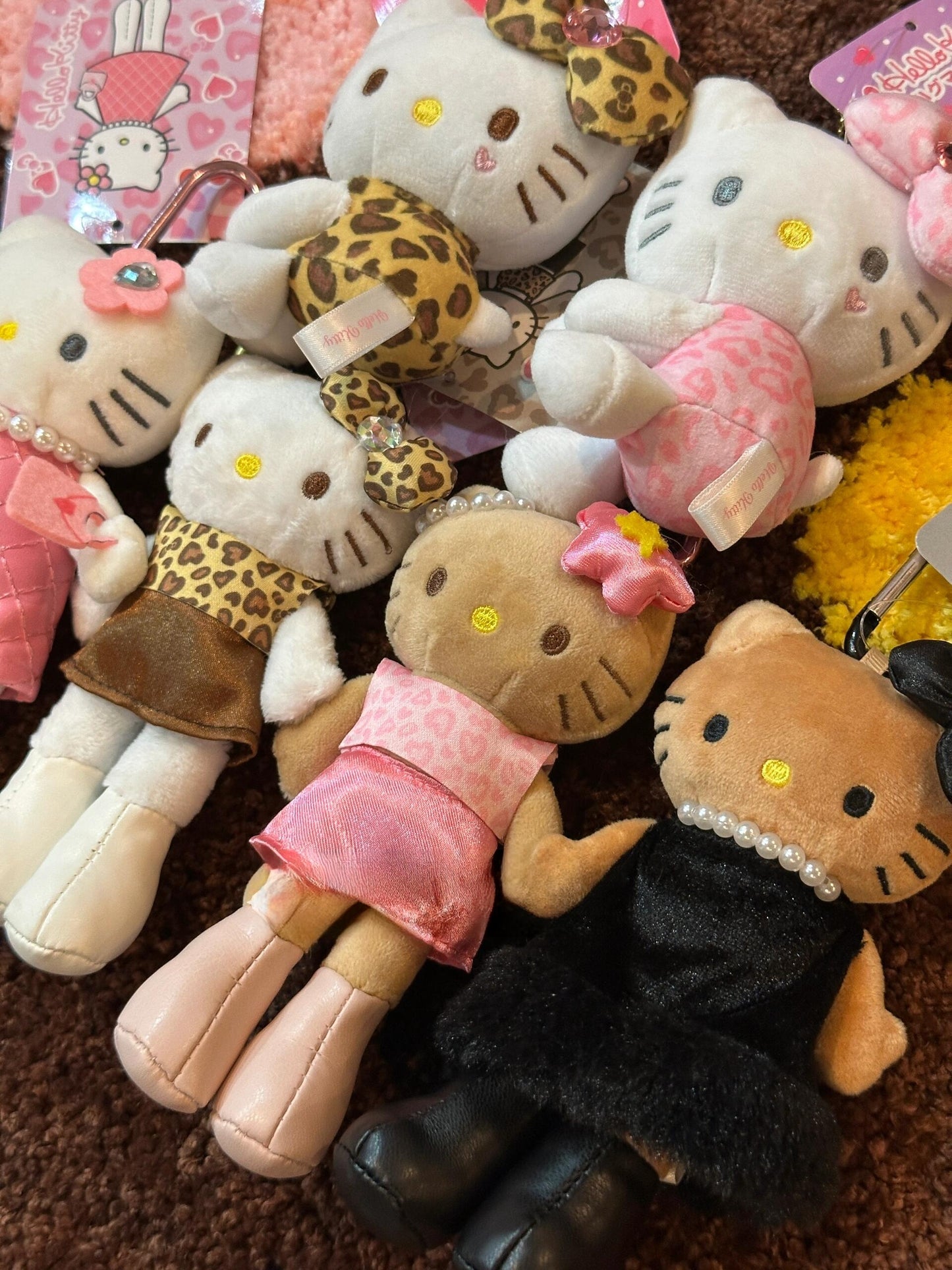 pink tanned long leg kitty pendant