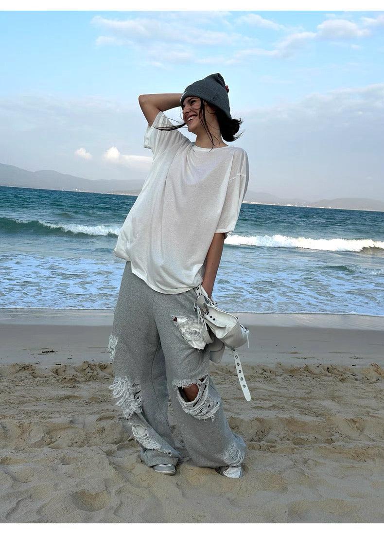 Grey ripped sweatpants