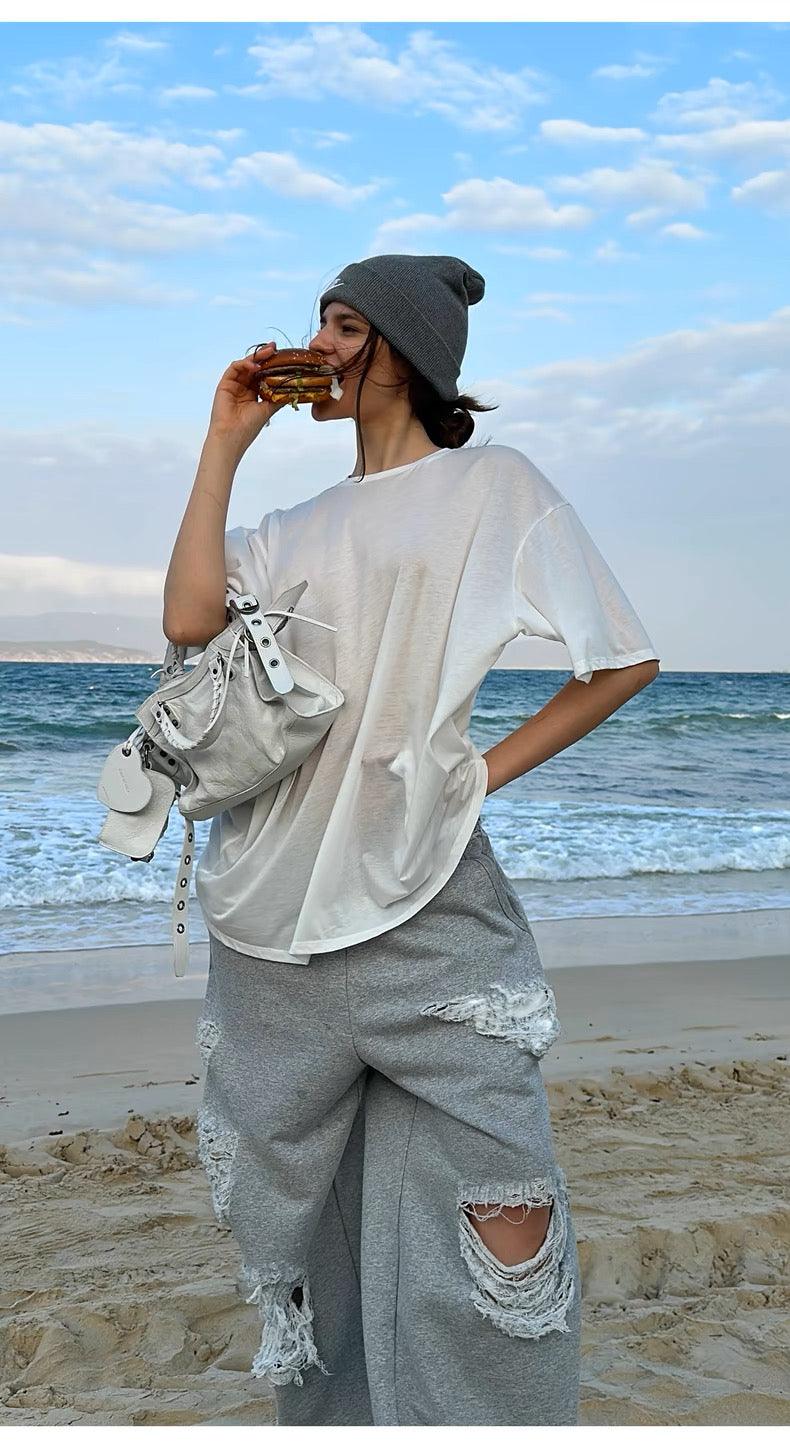 Grey ripped sweatpants