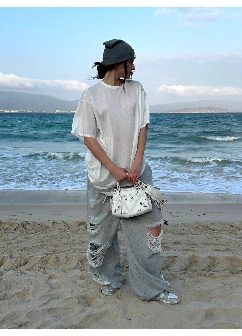 Grey ripped sweatpants