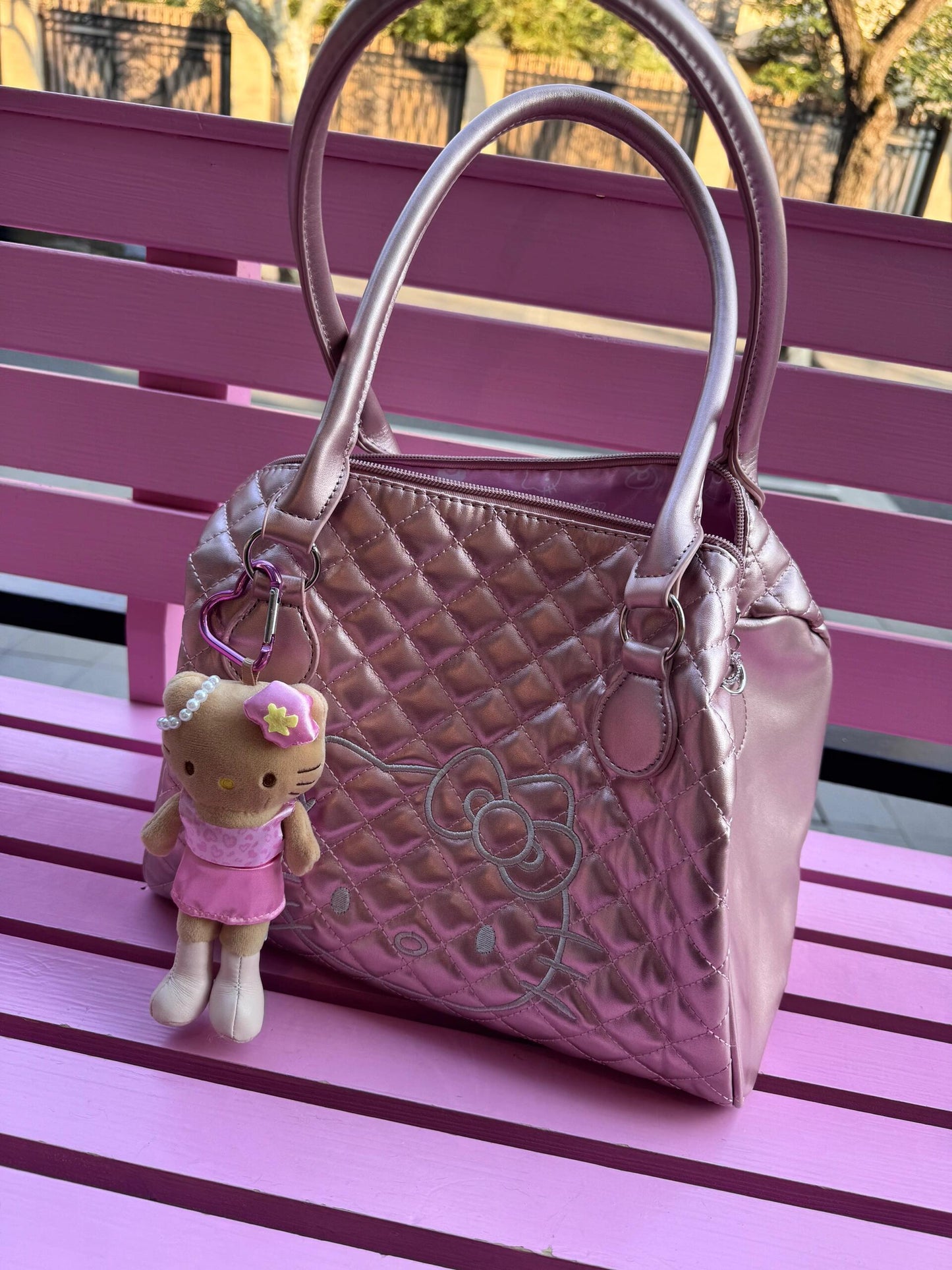 pink tanned long leg kitty pendant