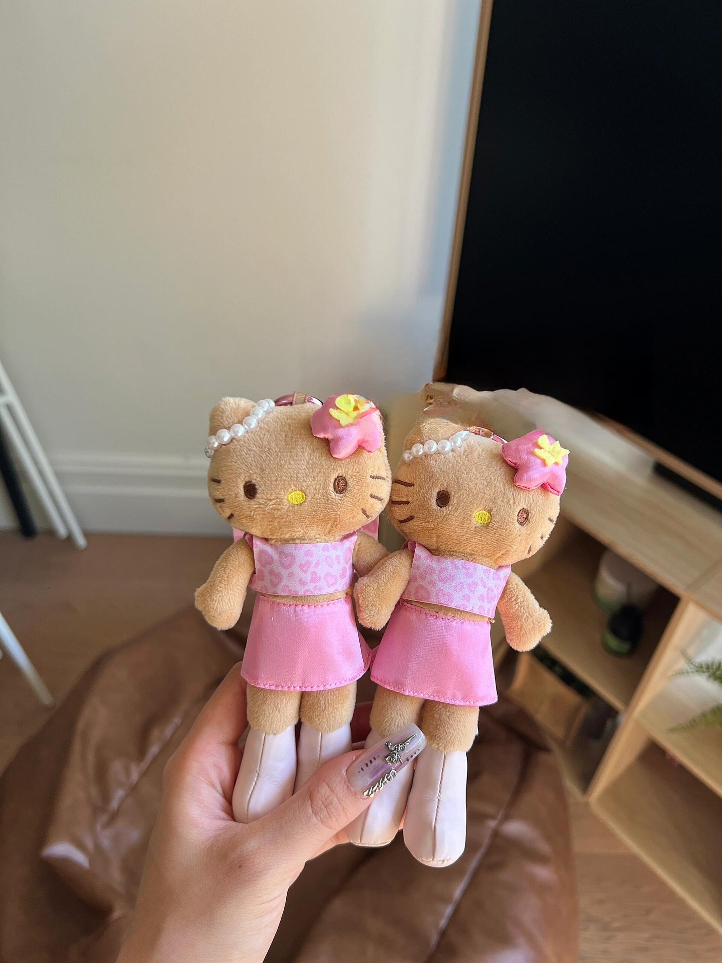 pink tanned long leg kitty pendant