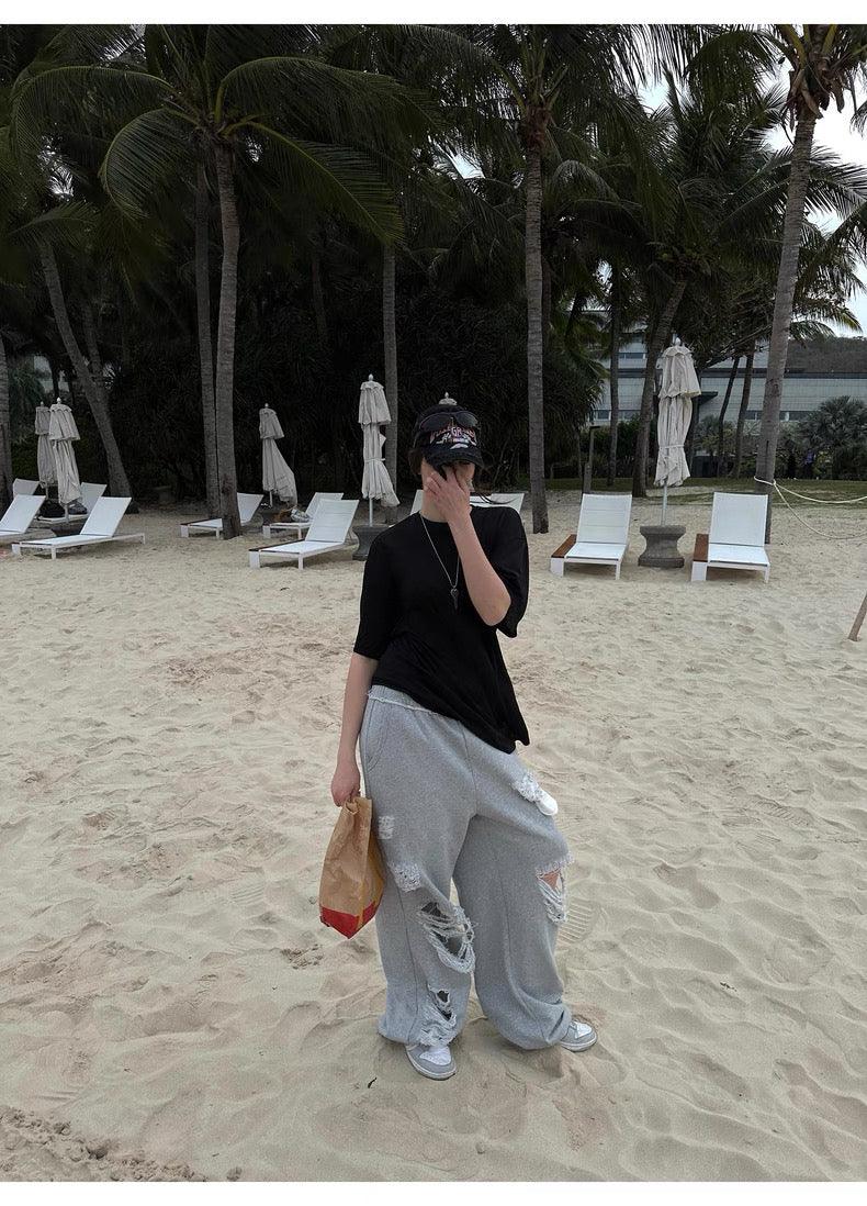 Grey ripped sweatpants