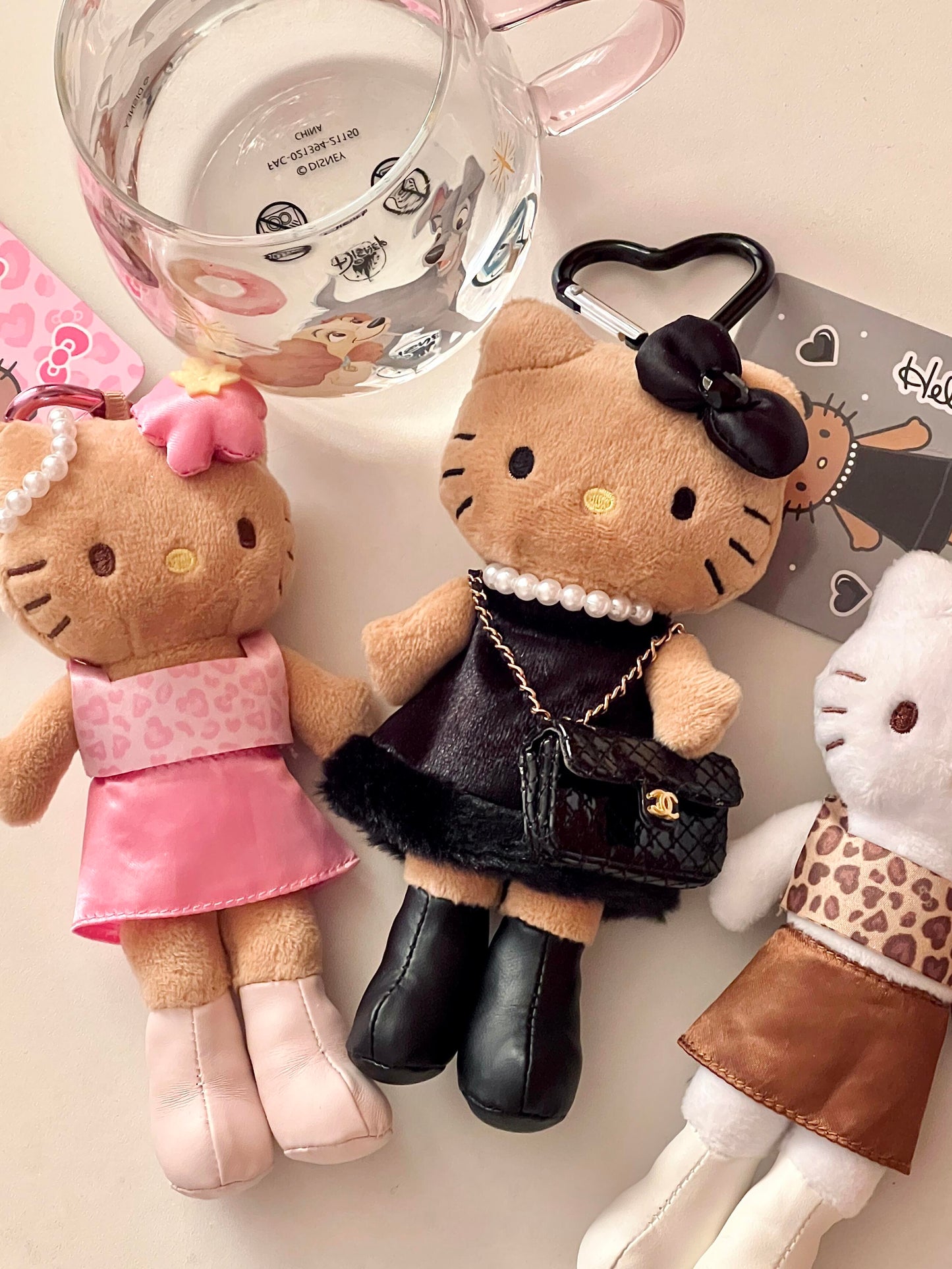 pink tanned long leg kitty pendant