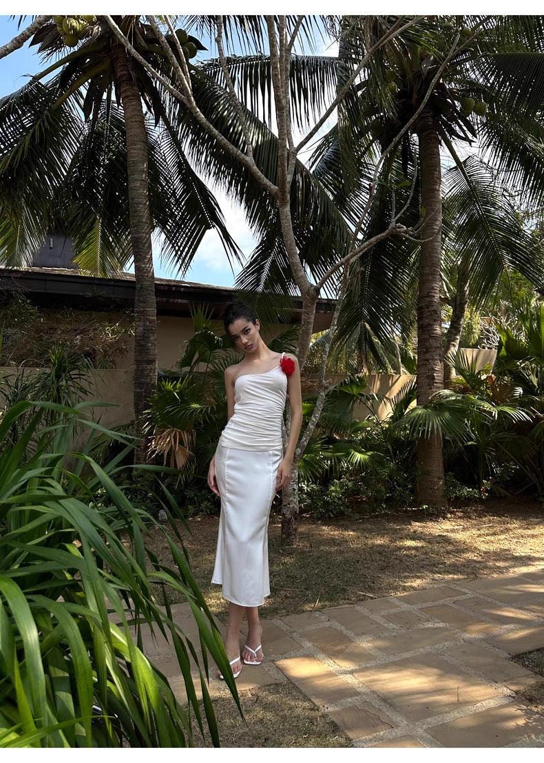 White slanted shoulder pleated suspender fishtail skirt set