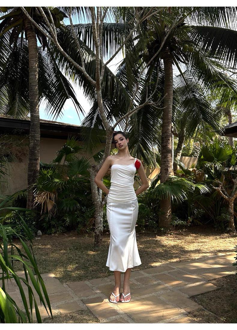 White slanted shoulder pleated suspender fishtail skirt set