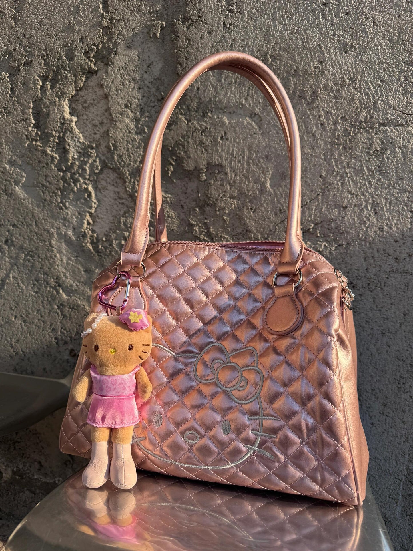 pink tanned long leg kitty pendant
