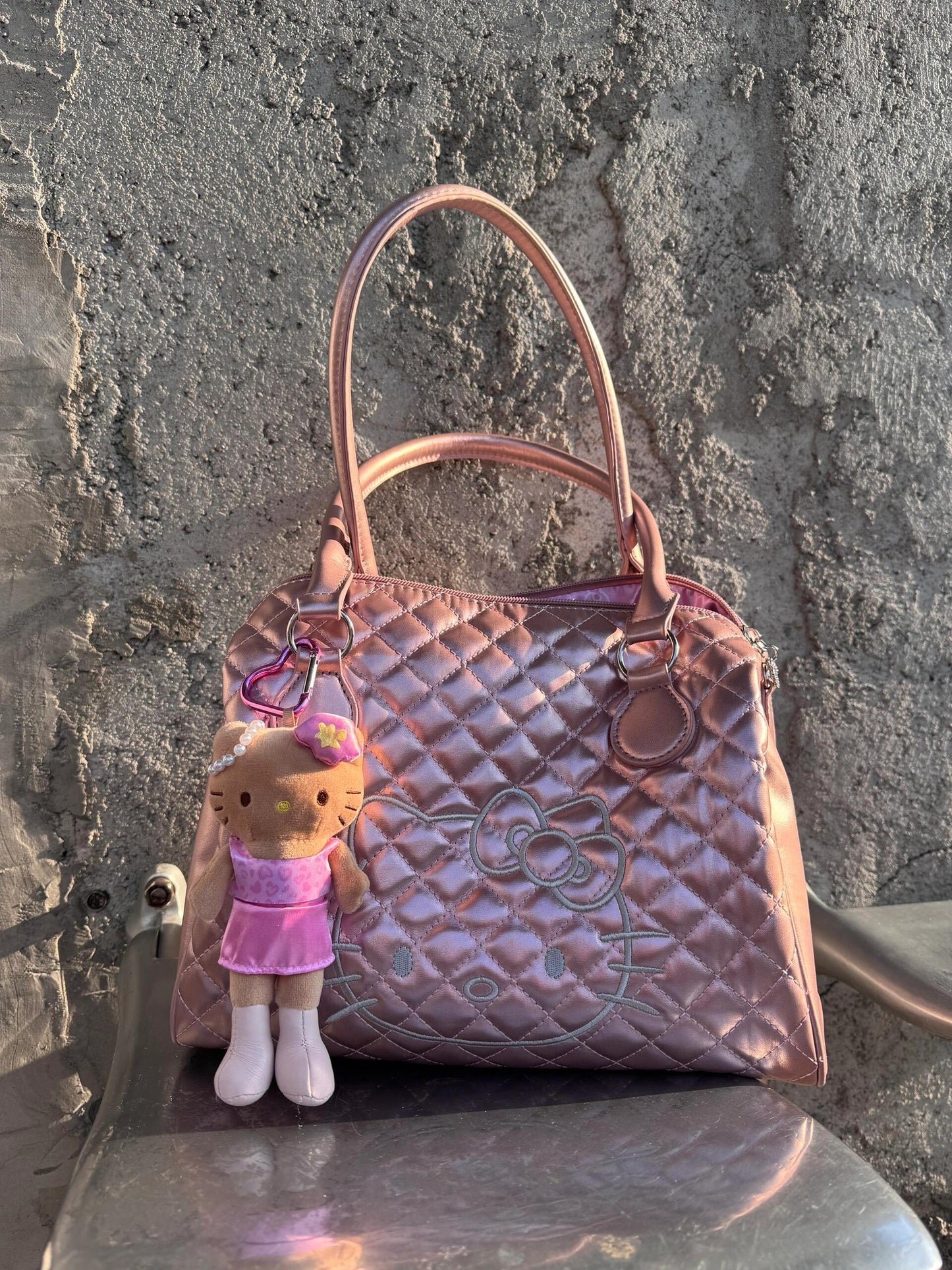 pink tanned long leg kitty pendant