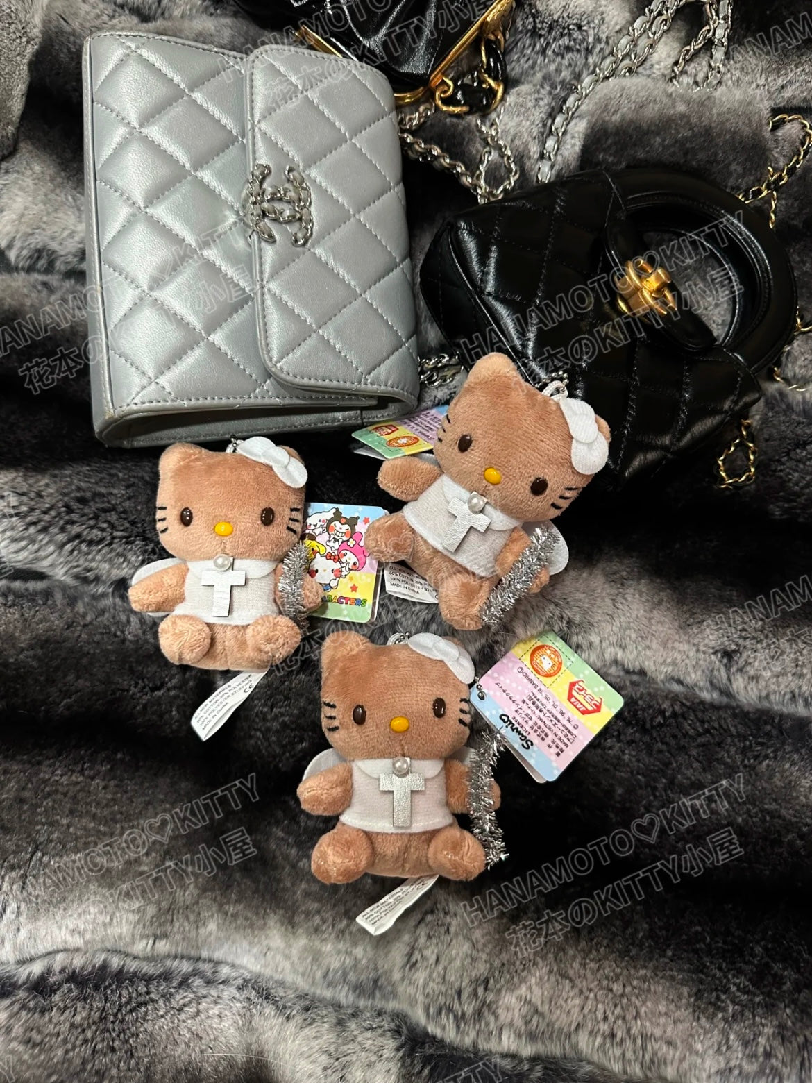 Angel tanned hello kitty pendant