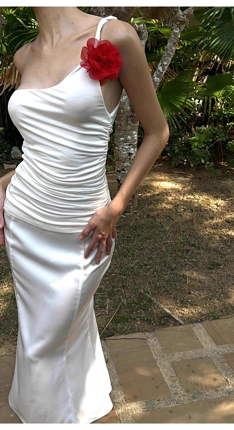White slanted shoulder pleated suspender fishtail skirt set