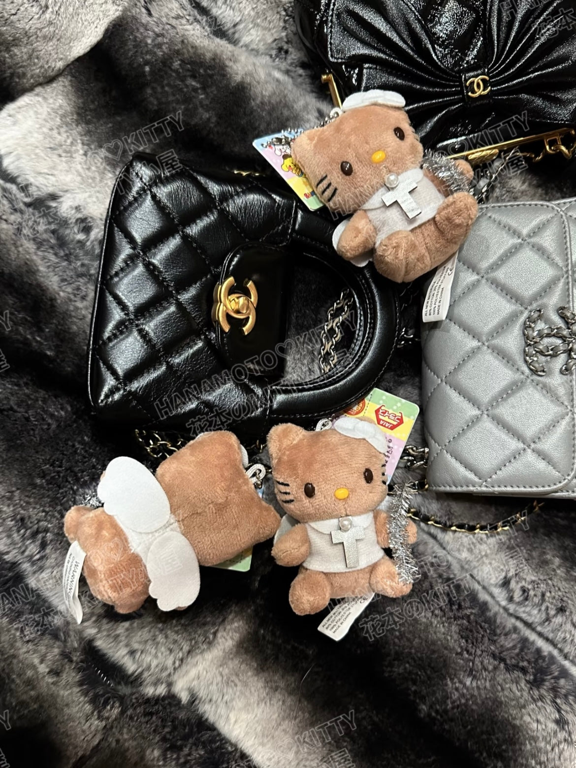 Angel tanned hello kitty pendant