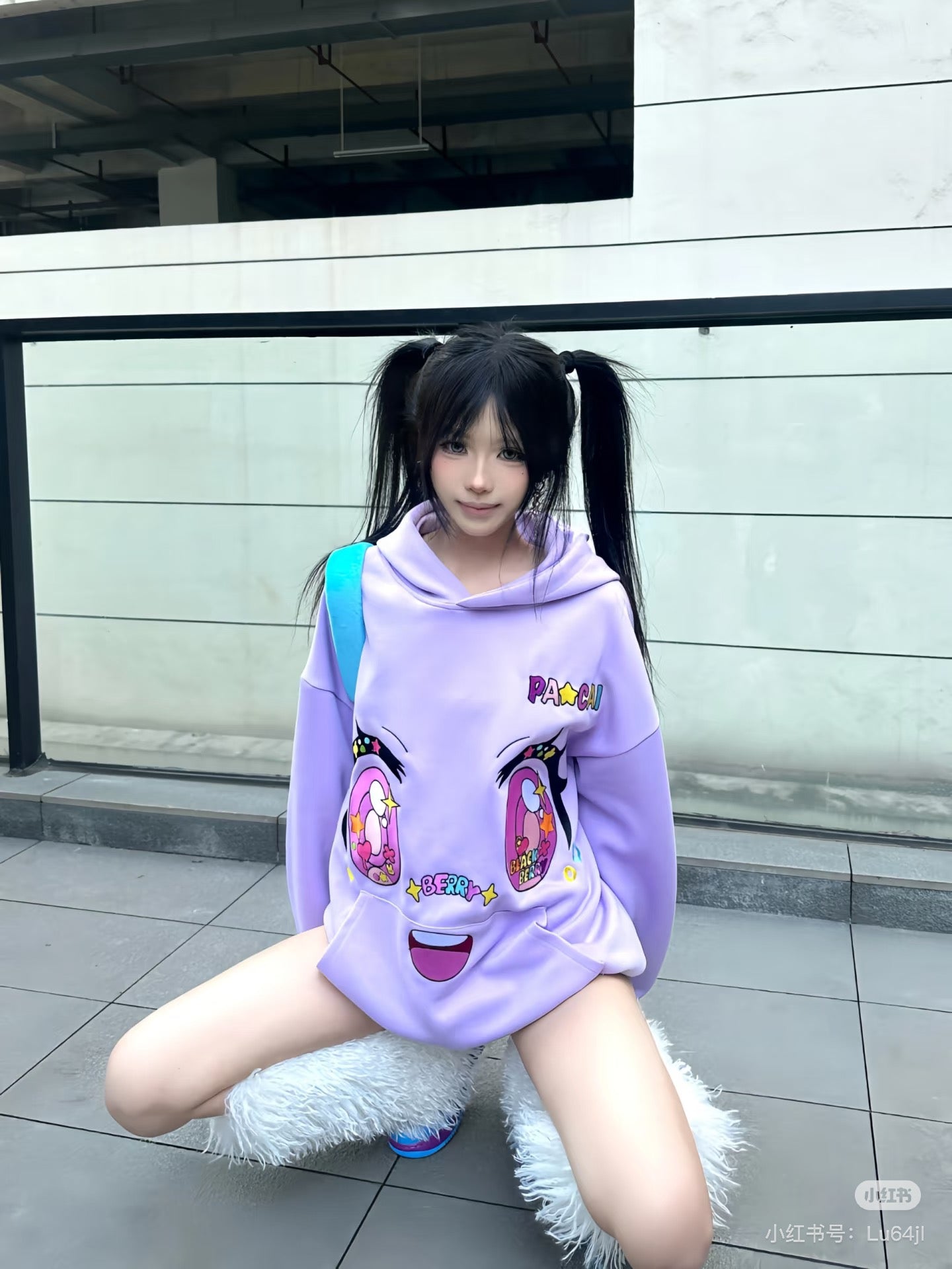purple comic embroidery emoji sweater