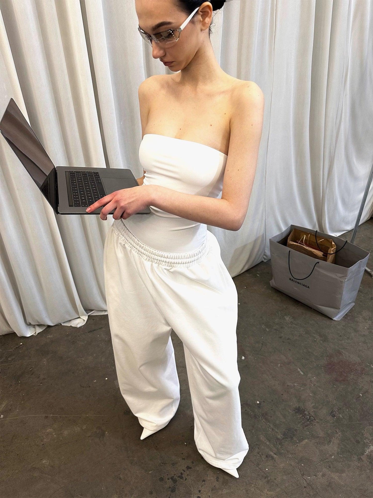 White shoulder vest