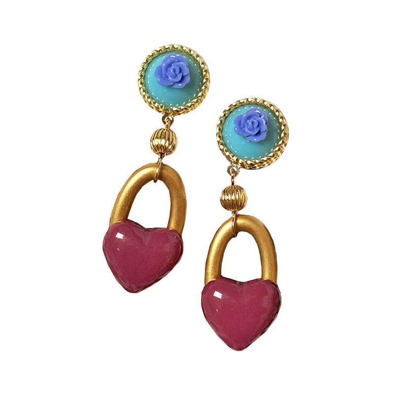 The 'Queen of the West' is an unparalleled beauty queen of Egypt, with classical and gorgeous color matching roses and wine heart earrings