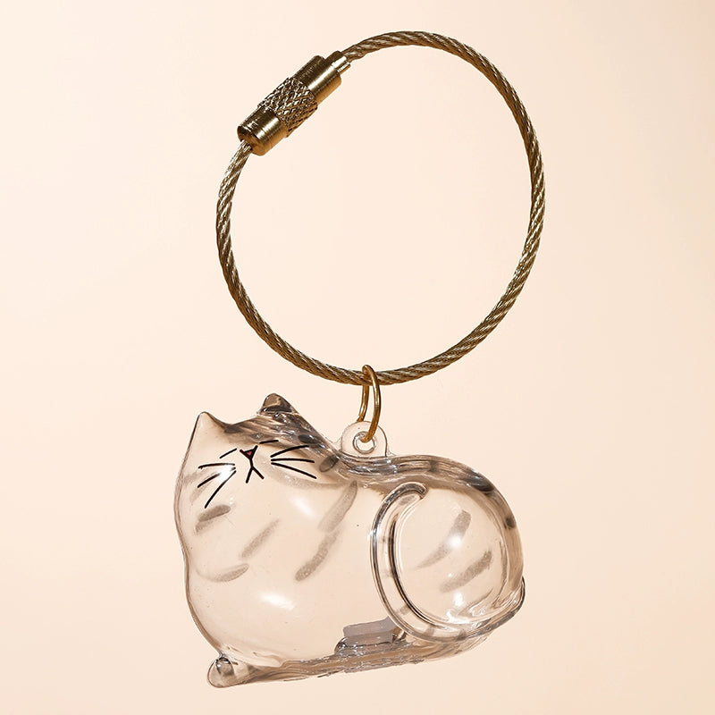 Transparent cat fur storage box with hanging decorations and twisted eggs