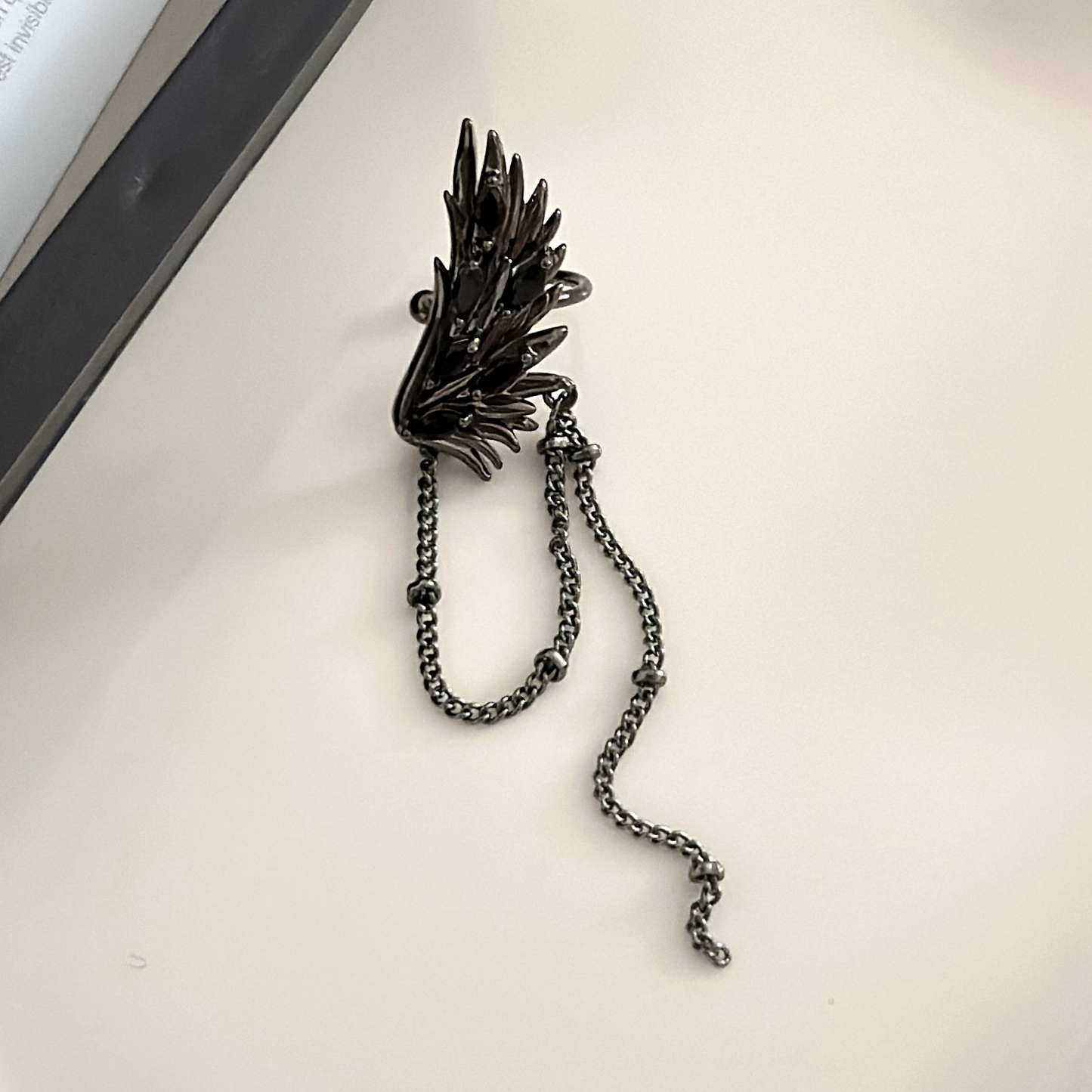 Black winged starry necklace earrings