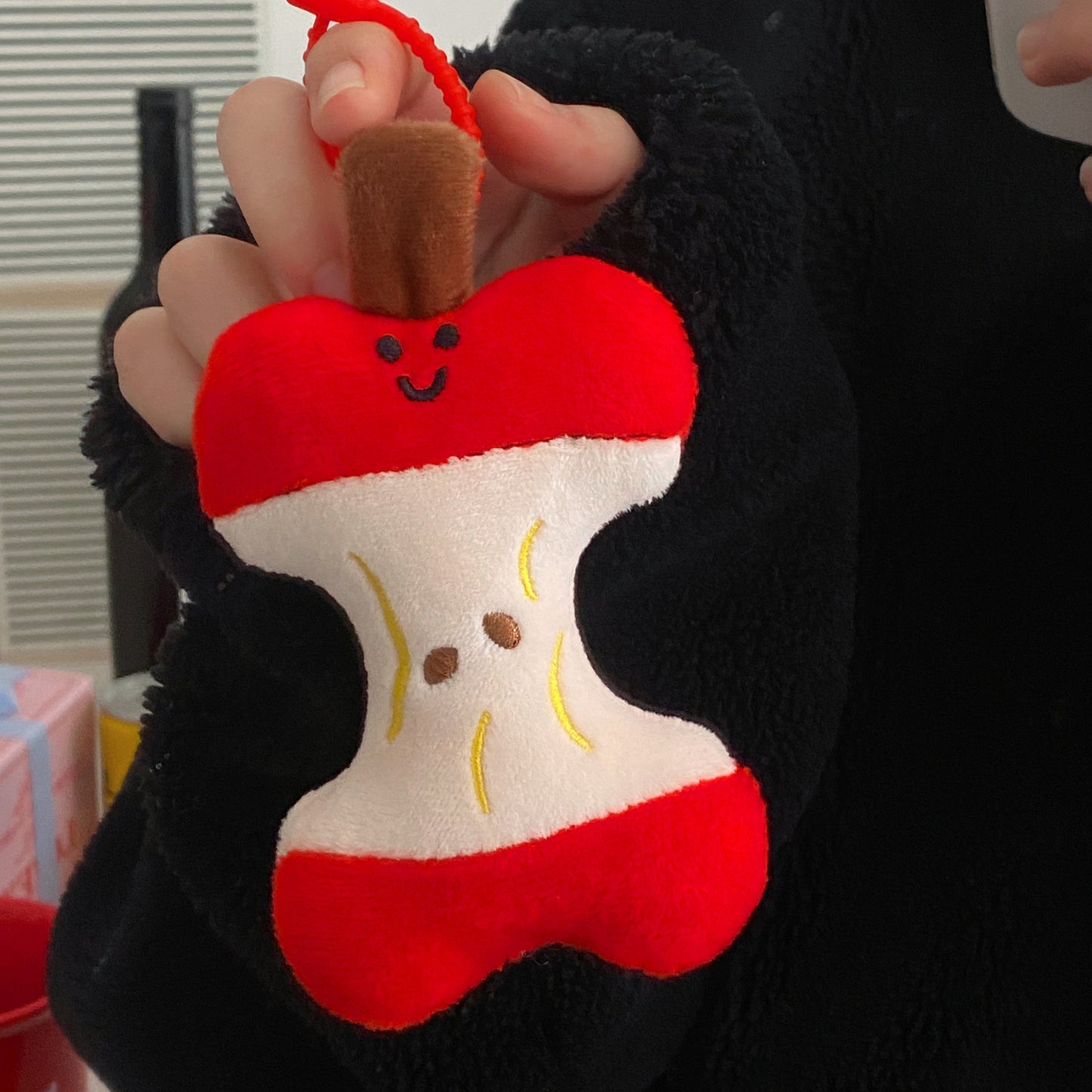 Take a bite of the apple plush pendant