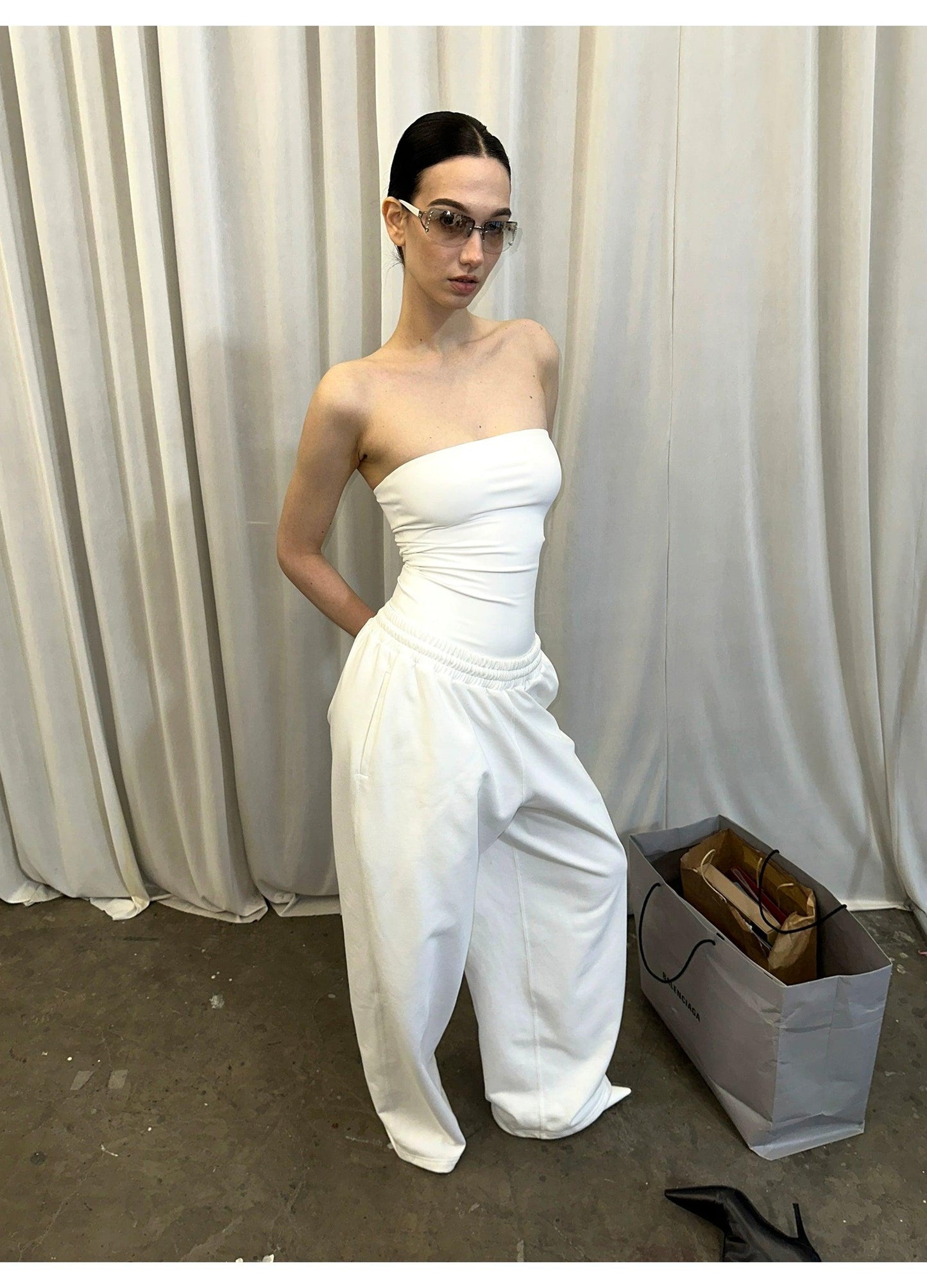 White shoulder vest