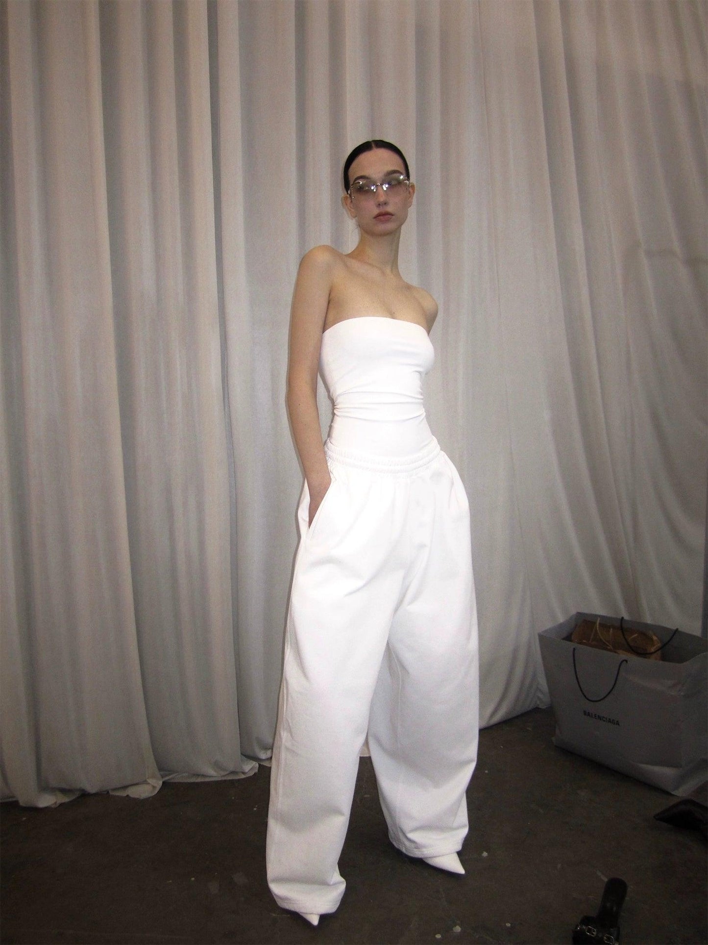 White shoulder vest