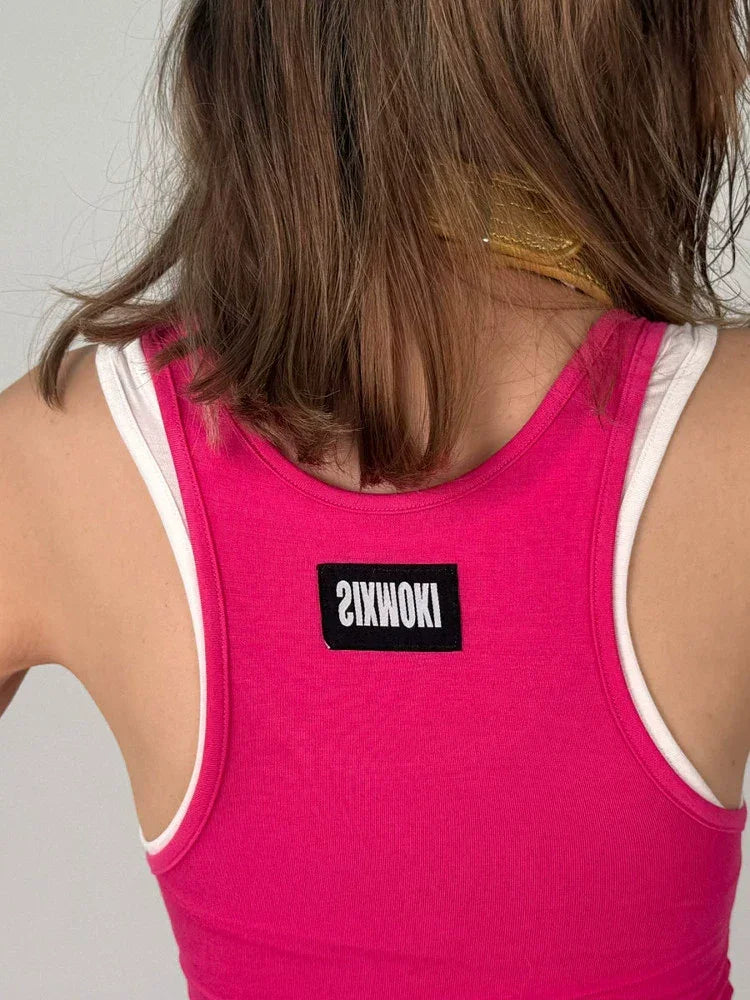 Stacked contrasting pink vest