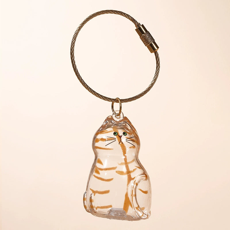 Transparent cat fur storage box with hanging decorations and twisted eggs