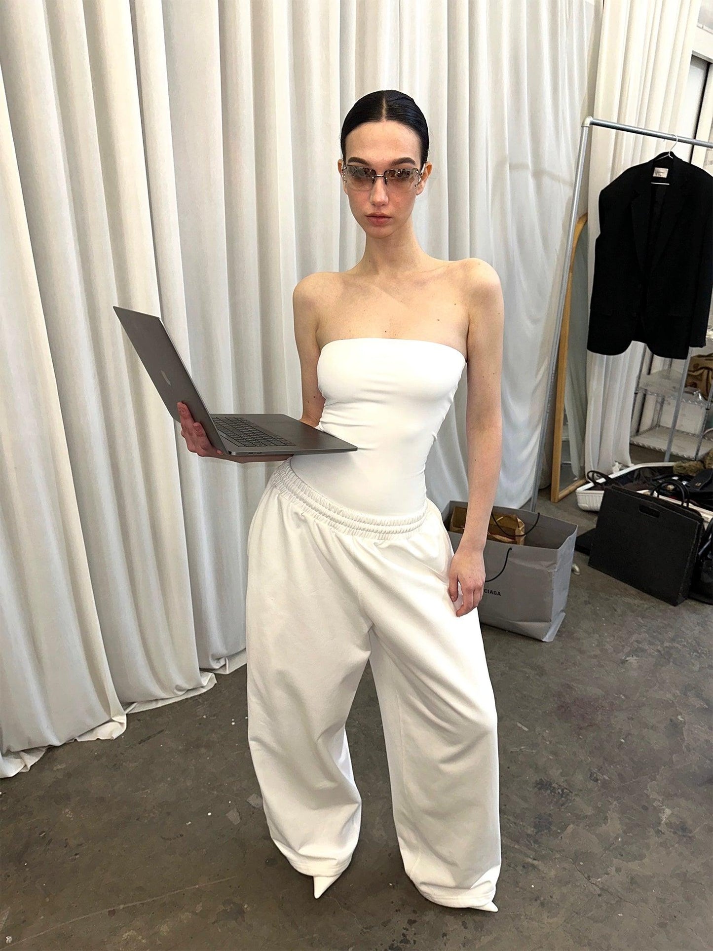 White shoulder vest
