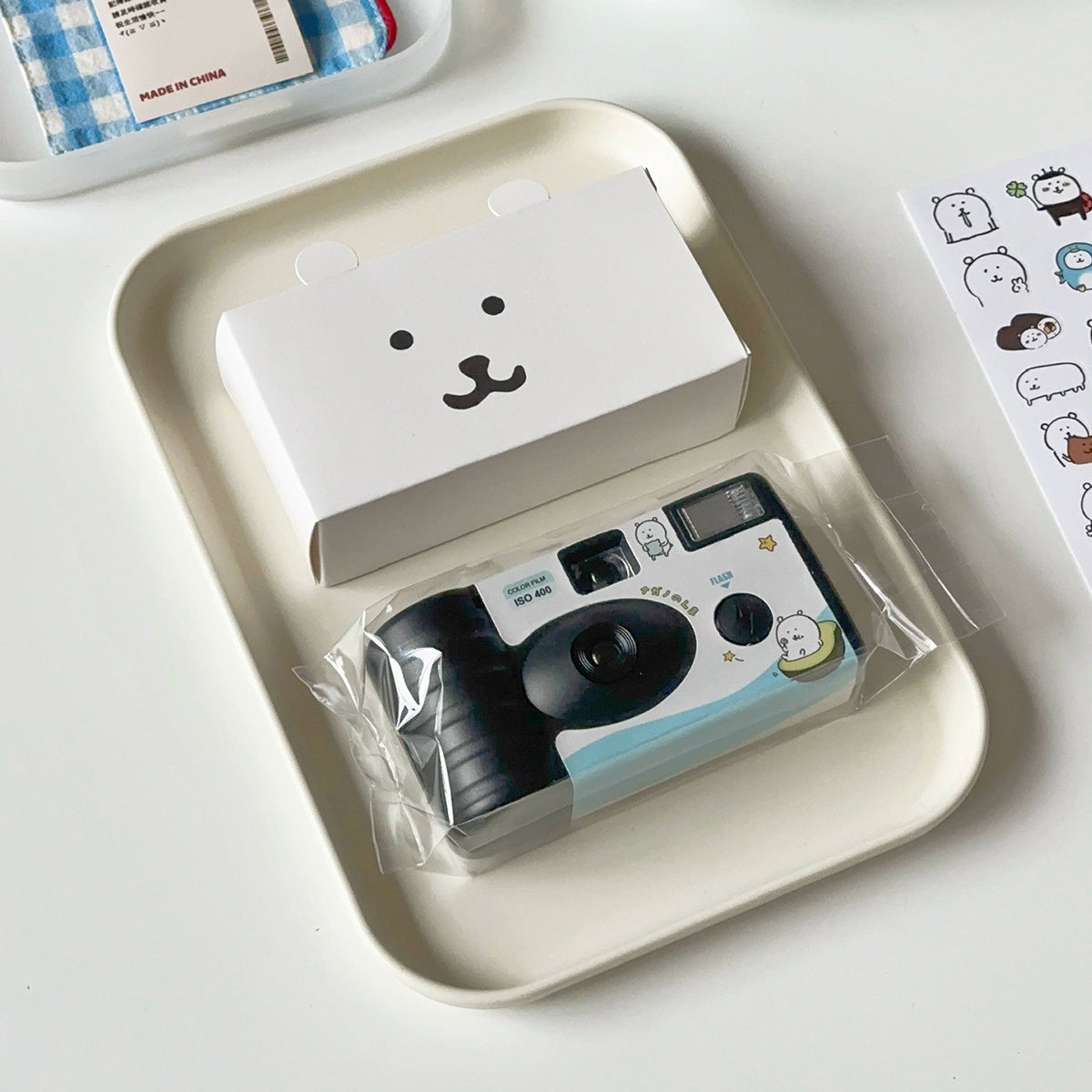 Self deprecating bear disposable film camera roll