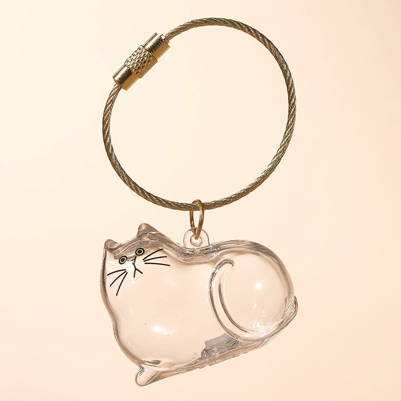 Transparent cat fur storage box with hanging decorations and twisted eggs
