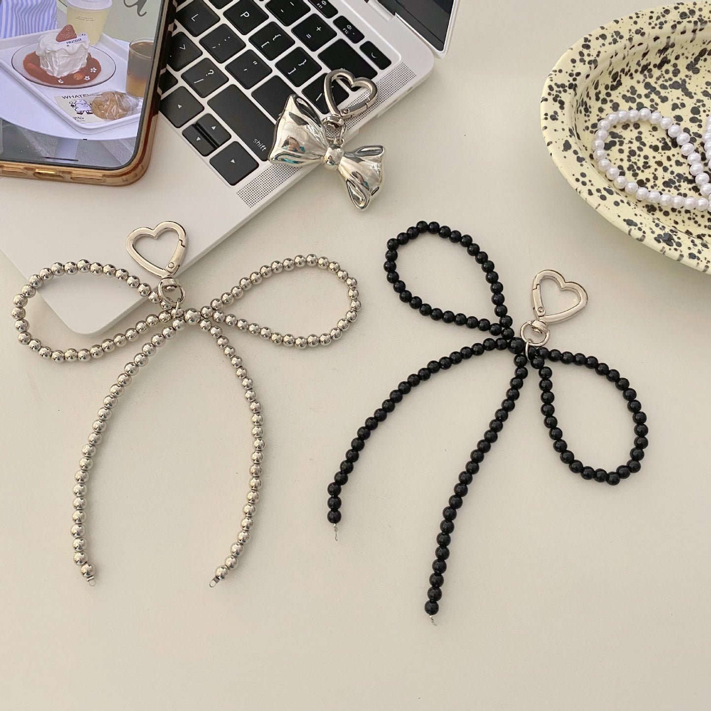 Beaded bow pendant