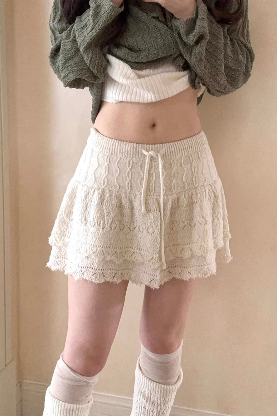 Make old hollow texture knitted short skirt