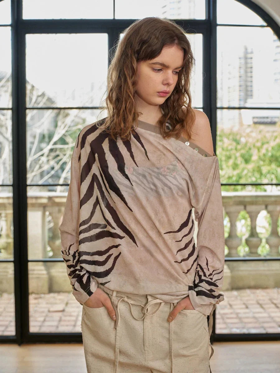 Zebra pattern slanted shoulder top