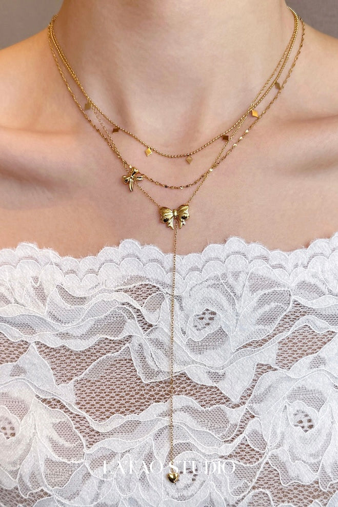 Dream Butterfly "Golden Bow Multi layered Long tassel Necklace