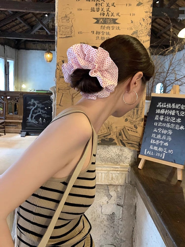 Pink polka dot scrunchie