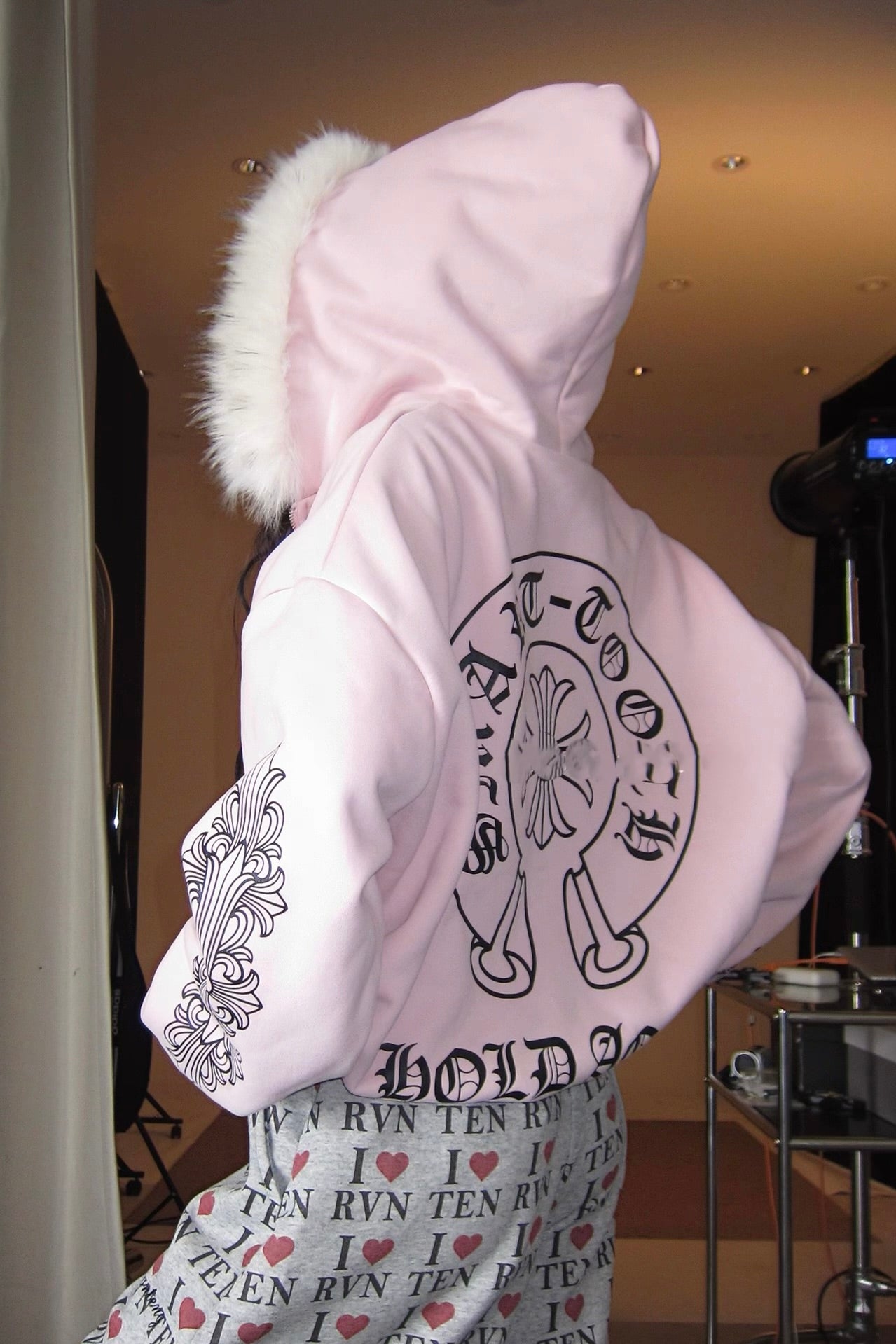 Pink hooded sweatshirt with fur collar