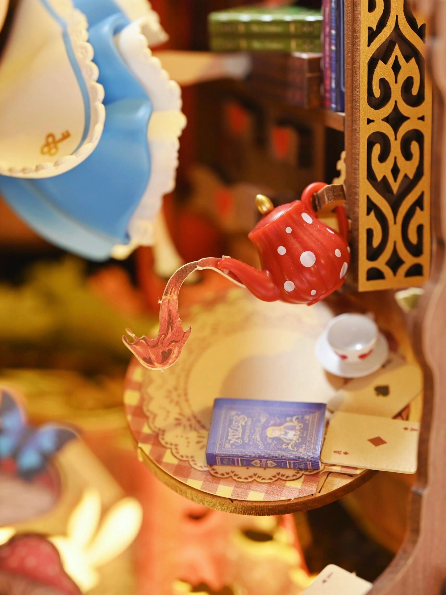 Alice falls into Wonderland, book stands, DIY hut assembles handmade building blocks