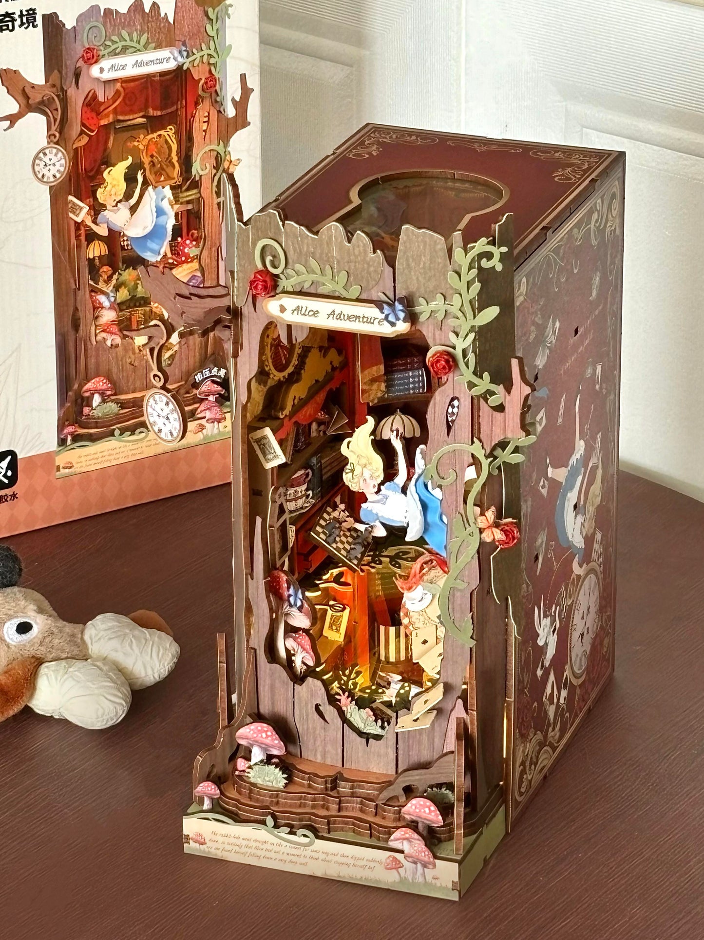 Alice falls into Wonderland, book stands, DIY hut assembles handmade building blocks