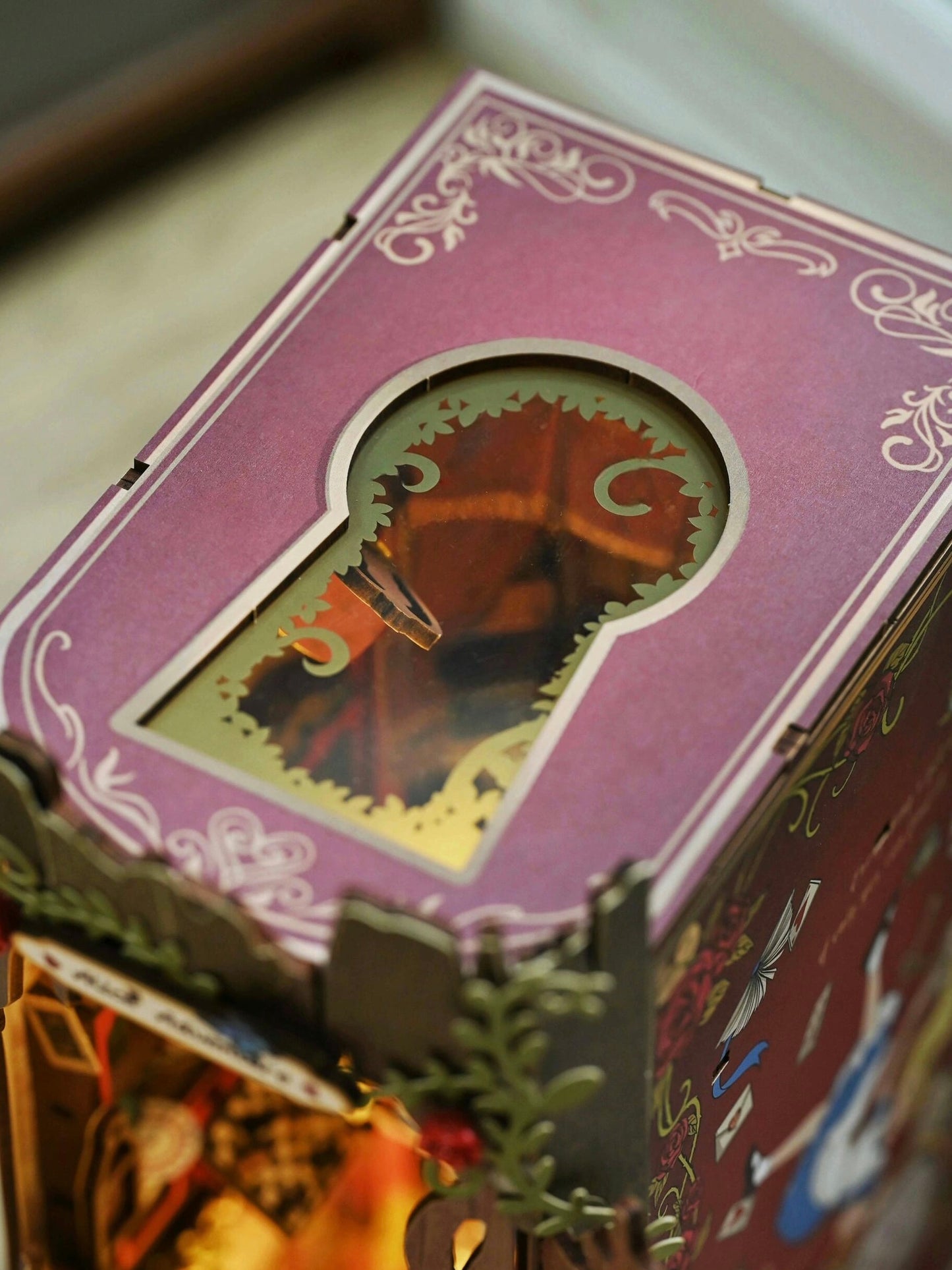 Alice falls into Wonderland, book stands, DIY hut assembles handmade building blocks