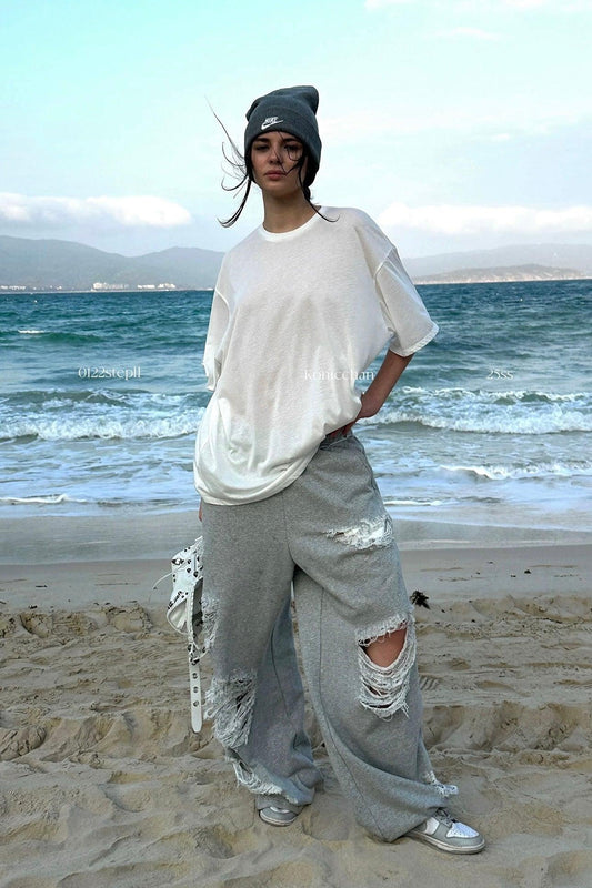 Grey ripped sweatpants
