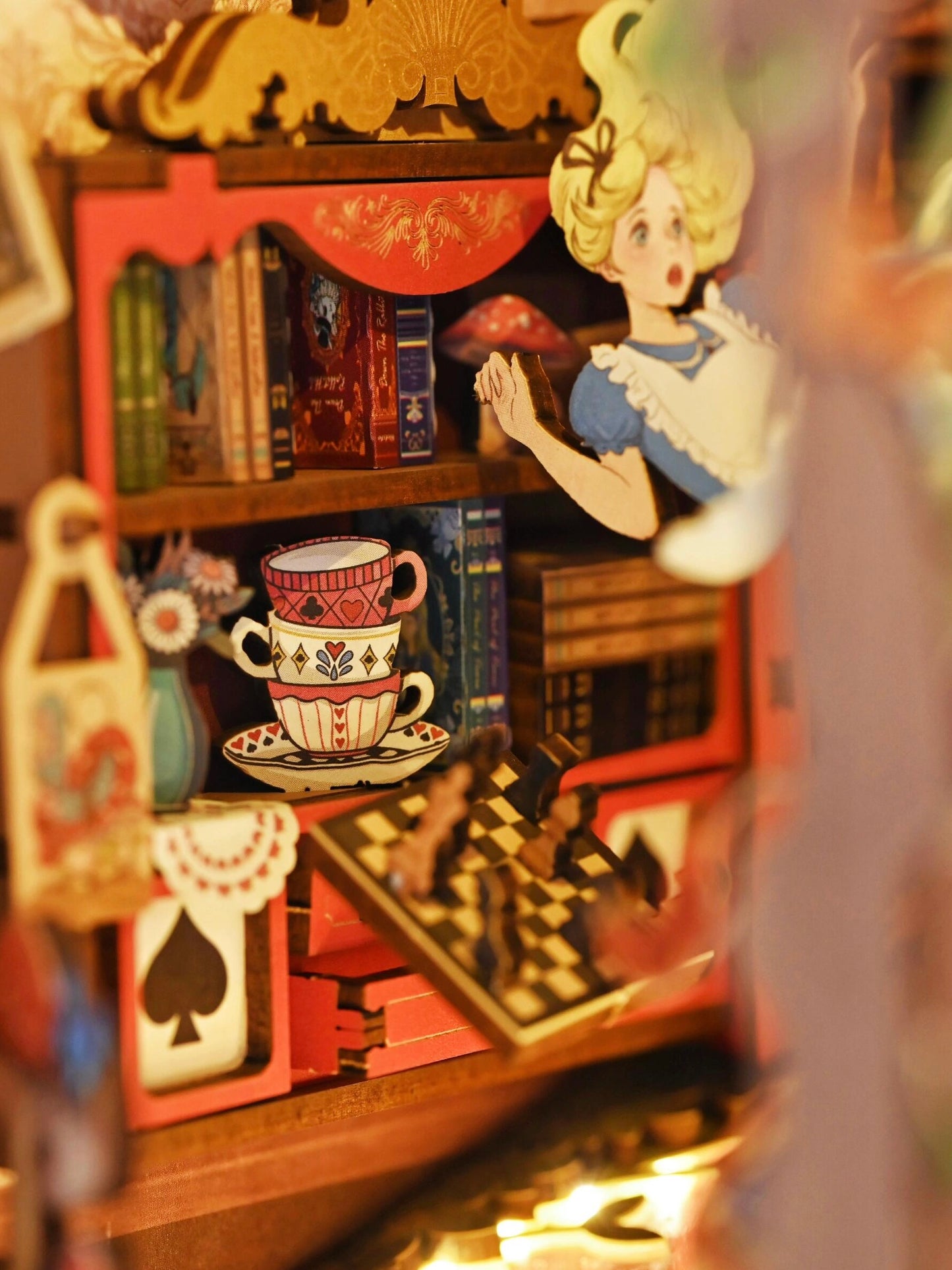 Alice falls into Wonderland, book stands, DIY hut assembles handmade building blocks