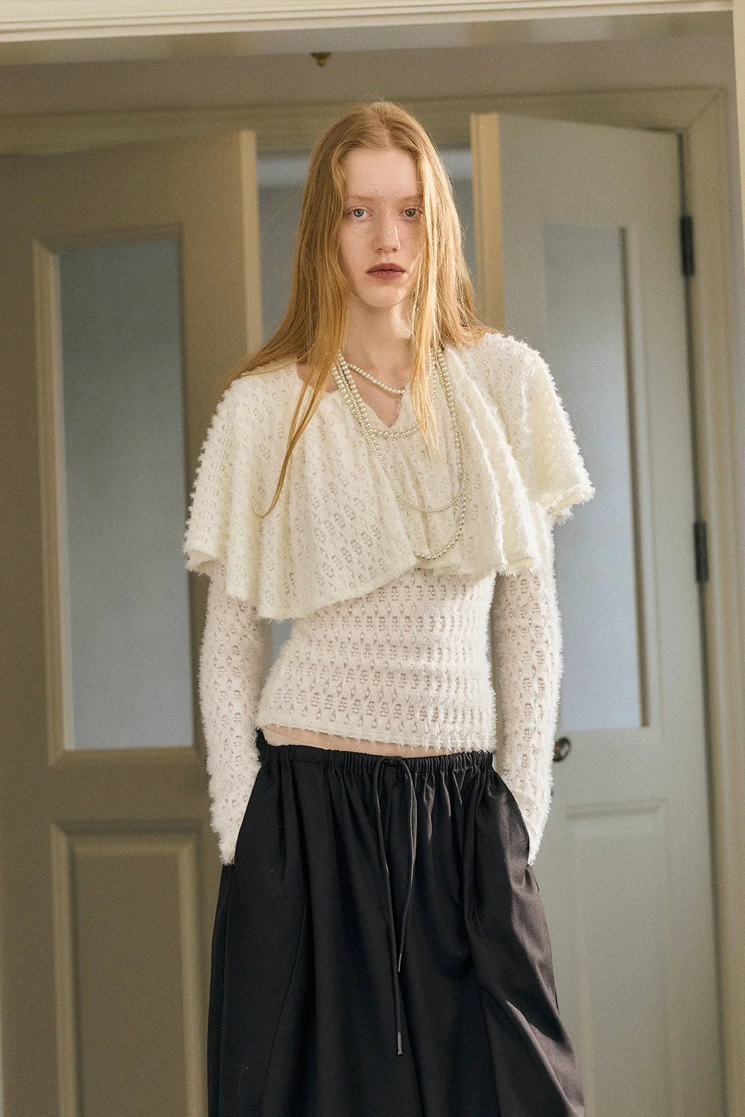 Victoria cape knitted top