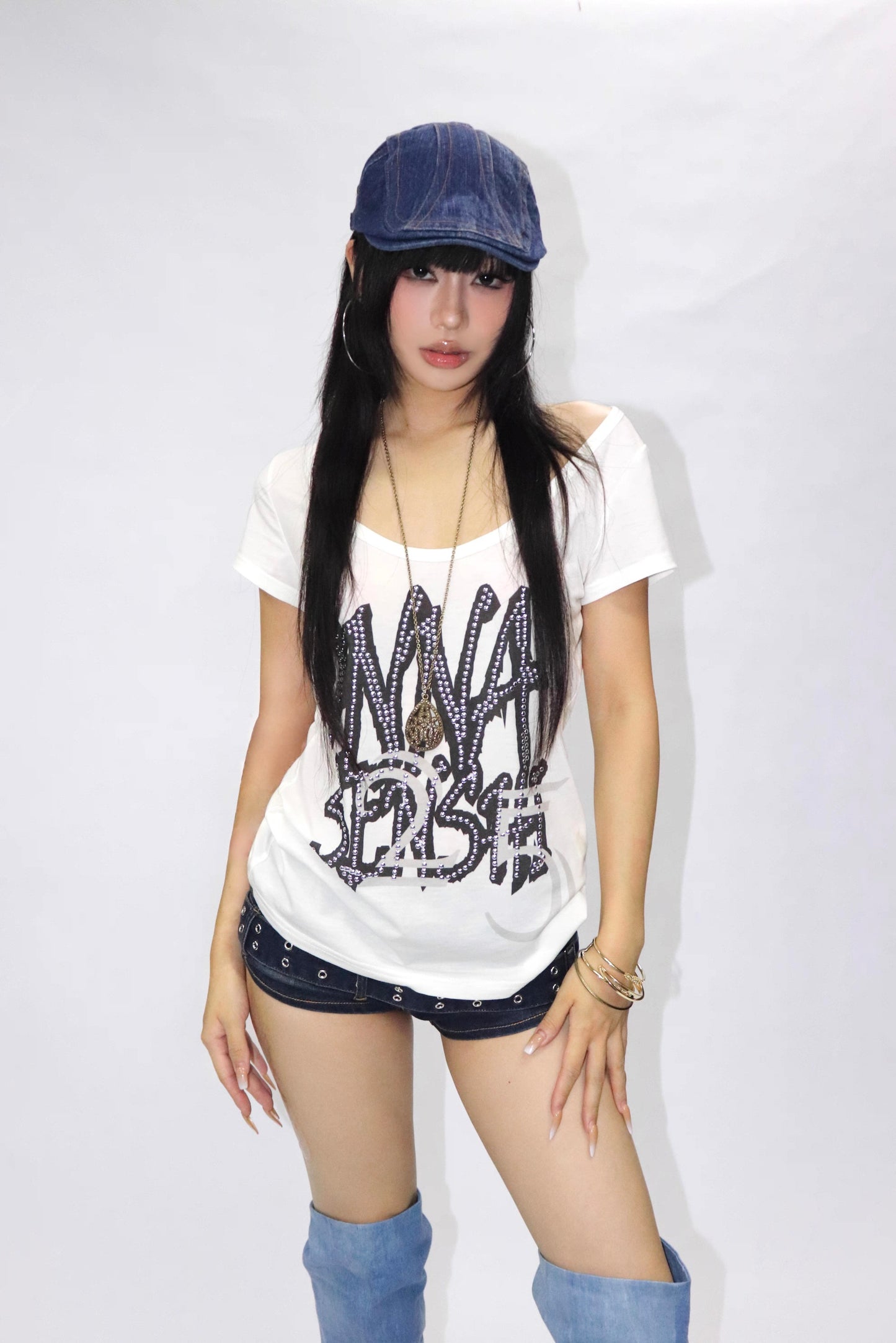 Old rivet print thin through T-shirt