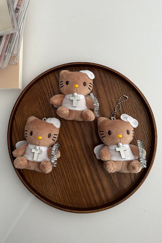 Angel tanned hello kitty pendant