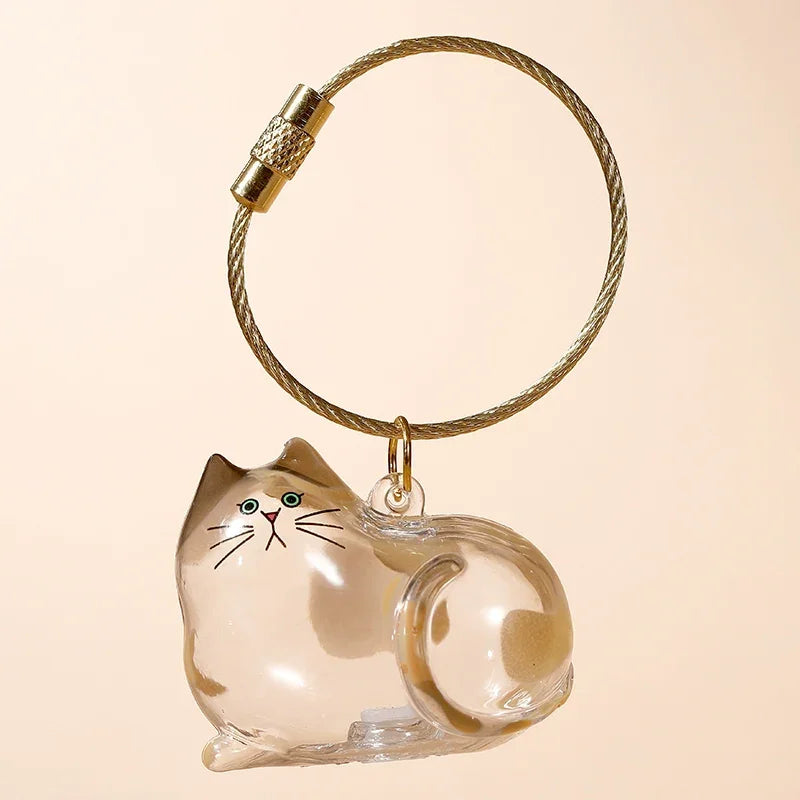 Transparent cat fur storage box with hanging decorations and twisted eggs