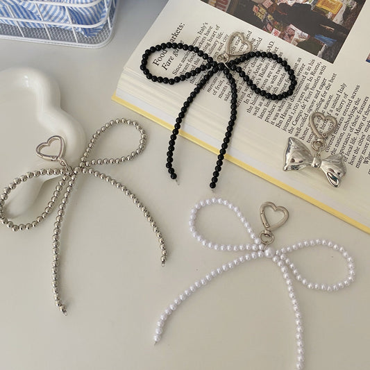 Beaded bow pendant