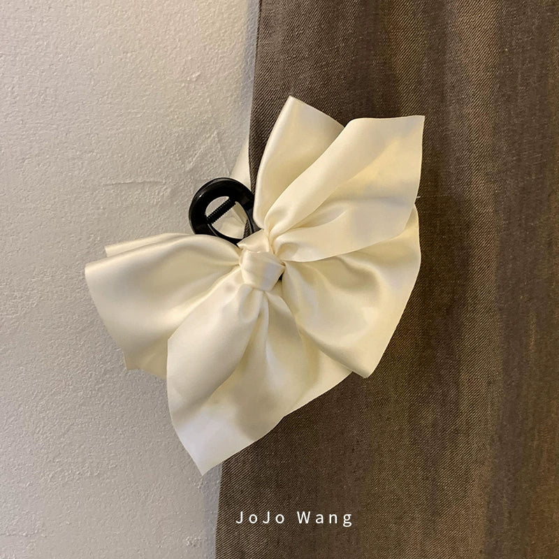 Satin bow hair catcher