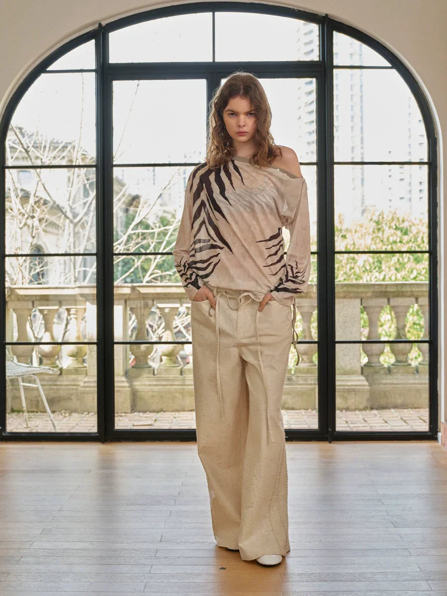 Zebra pattern slanted shoulder top