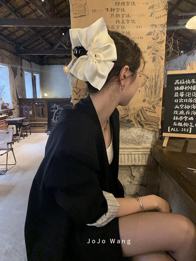 Satin bow hair catcher