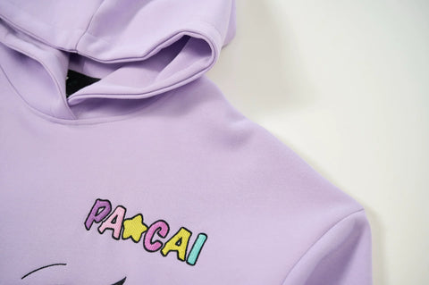 purple comic embroidery emoji sweater