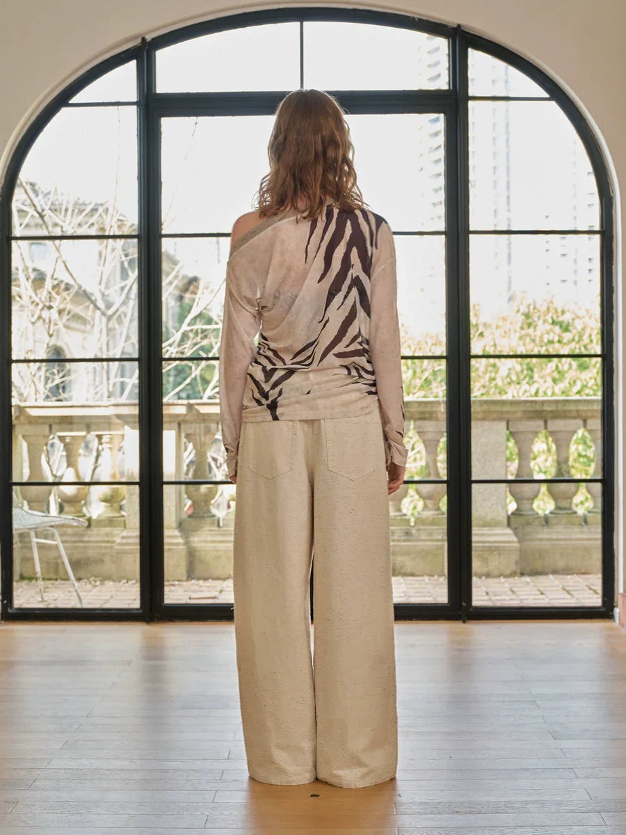 Zebra pattern slanted shoulder top